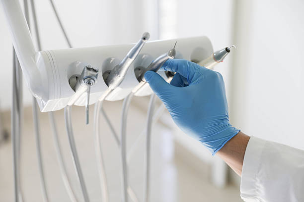 Professional Invisalign Clear Aligners technician working in Franklin, NH